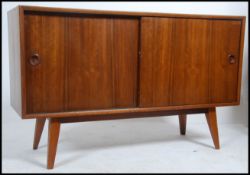 A 1950's Vanson teak wood sideboard in the manner of Peter Hayward.