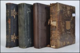 A collection of 19th - early 20th century leather and tooled photograph albums to include black and