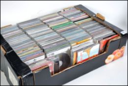 A large box of cd's and cd singles to include many various genres.