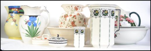 A collection of Bristol pottery wash jugs and bowls together with other item's.