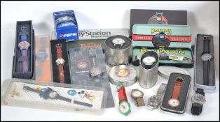 A collection of mainly cased collectors watches to include Batman, PLay Station, Tarzan,