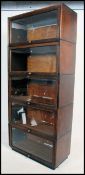 An early 20th century Globe Wernicke style oak stacking lawyers bookcase.