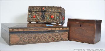A Victorian tunbridge inlaid workbox of sarcophagus form together with a Georgian inlaid single tea