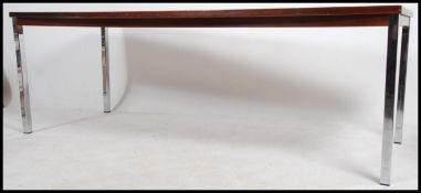 A retro 20th century large conference / dining table boat shaped in the manner of Florence Knoll