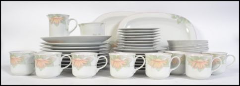 An extensive dinner service by Royal Doulton in the ' Rhapsody ' pattern consisting of dinner
