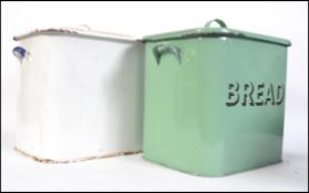 Two vintage retro mid 20th century enamel lidded bread bins.