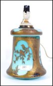 A Victorian aesthetic movement blue glass and brass mounted lamp ( converted oil lamp ) with