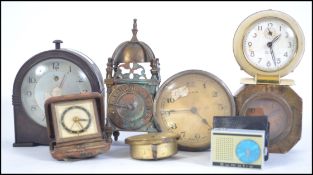 A collection of clocks to include cylinder bulkhead clock, bakelite mantel clock,