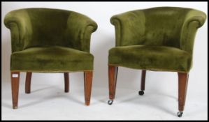 A pair of green velour late 19th / early 20th century Victorian armchairs with rolled arms,