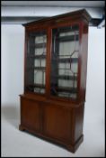 A good 19th century mahogany inlaid library bookcase cabinet.
