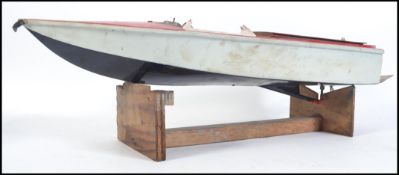 A 20th century remote control petrol driven pond yacht / boat ( A/F no controller ) having a red