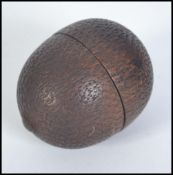 An early Victorian 19th Century treen kitchenalia nutmeg case.