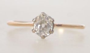 A Victorian 18ct gold and diamond ring having a single stone being old cut, oval mounted.