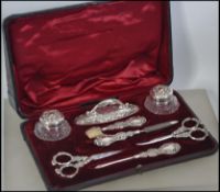 A beautiful silver hallmarked ladies vanity - manicure set complete in the velvet lined case.