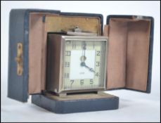 A 1930's Art Deco French travel alarm clock by JAZ.