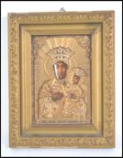 An early to mid century believed continental religious Ikon / icon set within gilt frame with