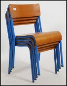 A set of four vintage mid 20th century church / village hall children's stacking chairs.