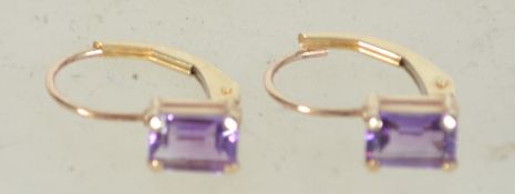 A pair of 10ct gold amethyst set earrings. Marked 10k Mexico.