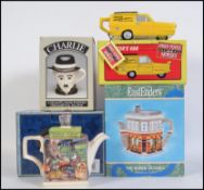 A group of collectable novelty teapots to include East Enders Queen Vic,