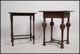 A 19th century mahogany Queen Anne revival side - lamp table raised on large cup and cover supports