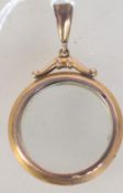 A 19th century Victorian hallmarked ( rubbed ) 9ct gold locket having double sided glass.