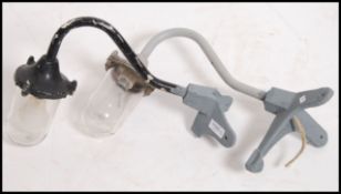 A pair of vintage industrial mid 20th century dairy lights.