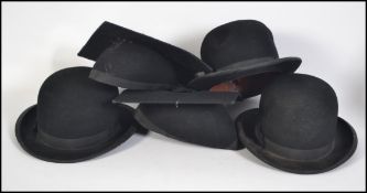 A group of three vintage 20th century bowler hats and two mortar boards with makers labels for