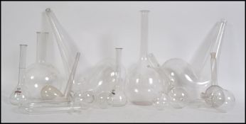 A collection of vintage / retro Chemists / Apocathery large and small distillation retorts,
