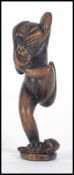 A Japanese 20th century carved boxwood netsuke,