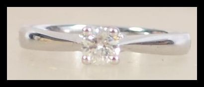 A hallmarked 18ct white gold and diamond solitaire ring. Hallmarked Sheffield.