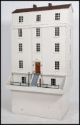 A stunning large 20th century Georgian style town house dolls house.