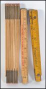 A collection of three vintage 20th century boxwood folding draughtsman's / carpenters rules to
