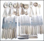 An extensive silver flatware cutlery service by John Round and Sons 1929 / 1930s to include 8 soup