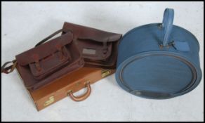 A retro round Atlantic suitcase together with 2 vintage leather satchels and a leather attache