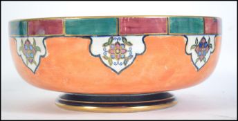 An early 20th century Grimwades Byzanta ware lustre bowl of large form with geometric patterns and