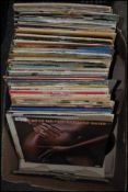 A large collection of vinyl long play LP and 12