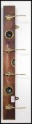 A vintage early to mid 20th century brass and wooden spirit level by Stanley being converted to a