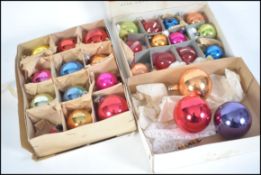 A collection of 1950's Christmas sphere shaped glass baubles in various colours