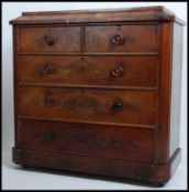 A Victorian mahogany large caddy top chest of drawers raised on plinth base with castors having 2