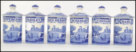 A collection of six blue and white lidded Italian Spode spice / storage jars each with a different