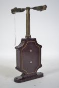 A 19th century German patented manual centrifuge test tube instrument with cast metal body in