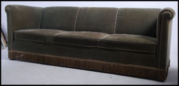 A good Georgian style Chesterfield sofa in the manner Wesley Barrel settee being of upright form