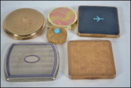 A collection of ladies vintage compacts to include Stratton, Caimant, faux turquoise set,
