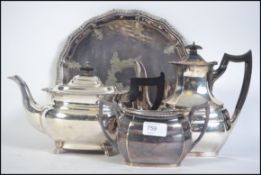 A 20th century Mappin and Webb silver plated three piece tea service consisting of teapot,