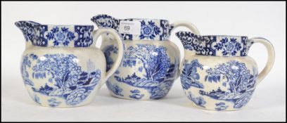 A set of the vintage blue and white graduating vases in the Ming pattern by TG Green.