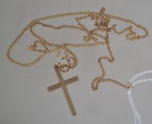 A hallmarked 9ct gold curb linked necklace chain with spring hoop clasp and a hallmarked 9ct gold