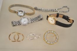 A collection of costume jewellery to include a silver bow brooch in presentation case,