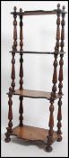 A Victorian mahogany and marquetry inlaid whatnot etagere.