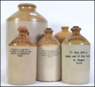 A collection of early 20th century stoneware flagon's, bottles etc. All from Bristol.