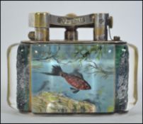 A rare Dunhill Chromium plated brass and lucite aquarium table lighter.